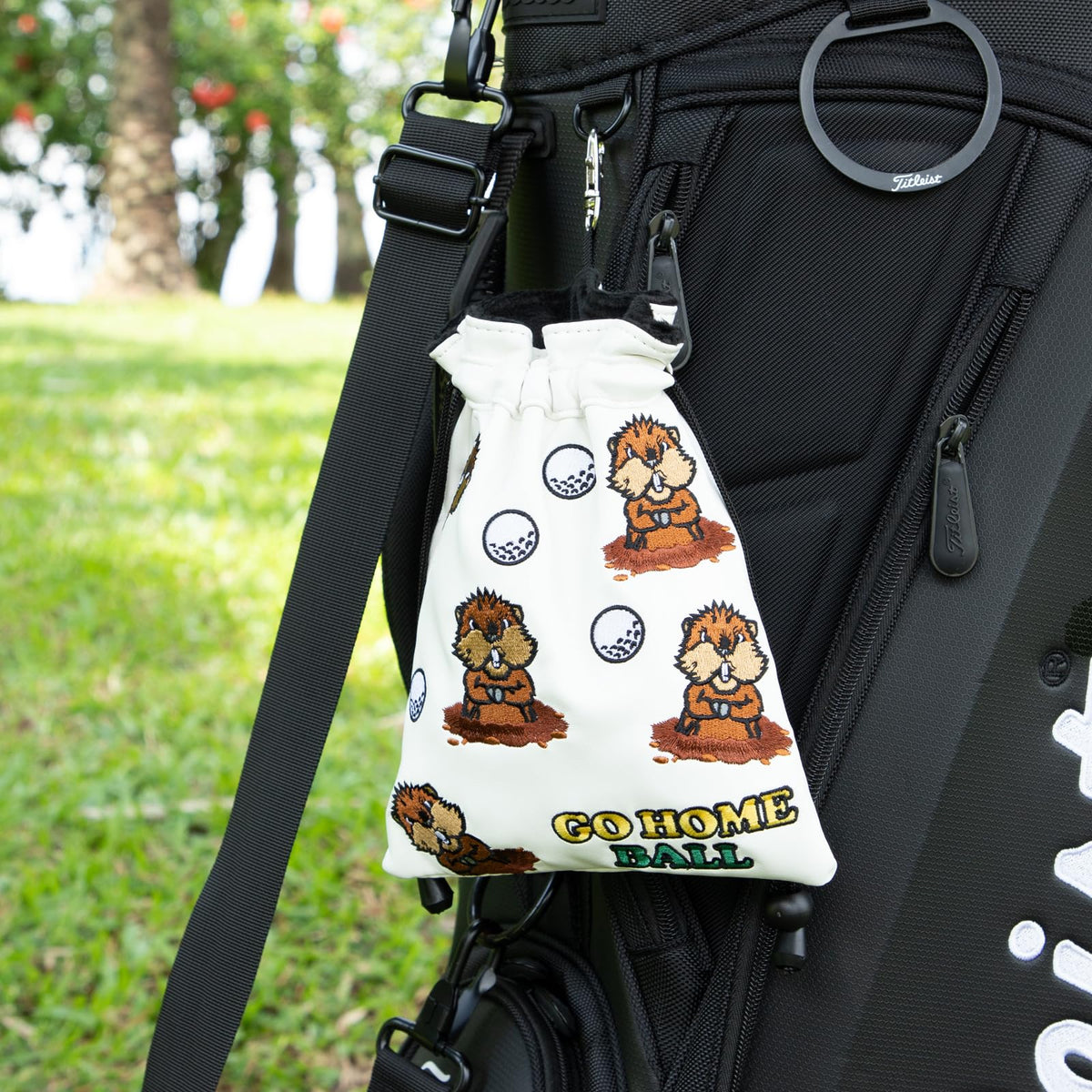 Barudan Golf drawstring closure keeps items secure during swings and walks.