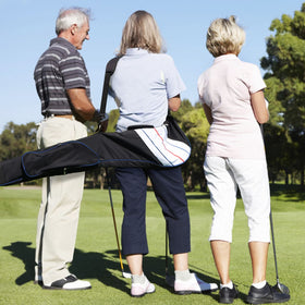 BIG TEETH golf bag on driving range demonstrating easy access and shoulder strap