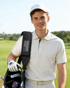 BIG TEETH golf bag strap clipping securely to D-rings on a bag.