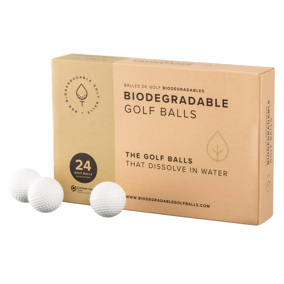 Biodegradable Golf Balls dissolving in water for eco-friendly lakeside practice.