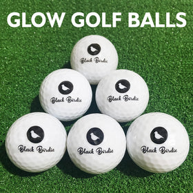 Glow golf balls illuminate the green for easier tracking at night.