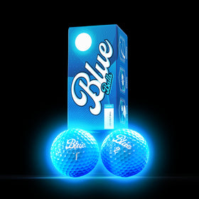 Blue Balls LED golf balls glow brightly on the course at night