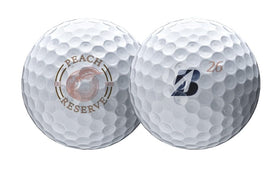 Bridgestone Tour B RX Peach Reserve ball in hand showing feel and control for versatile short game