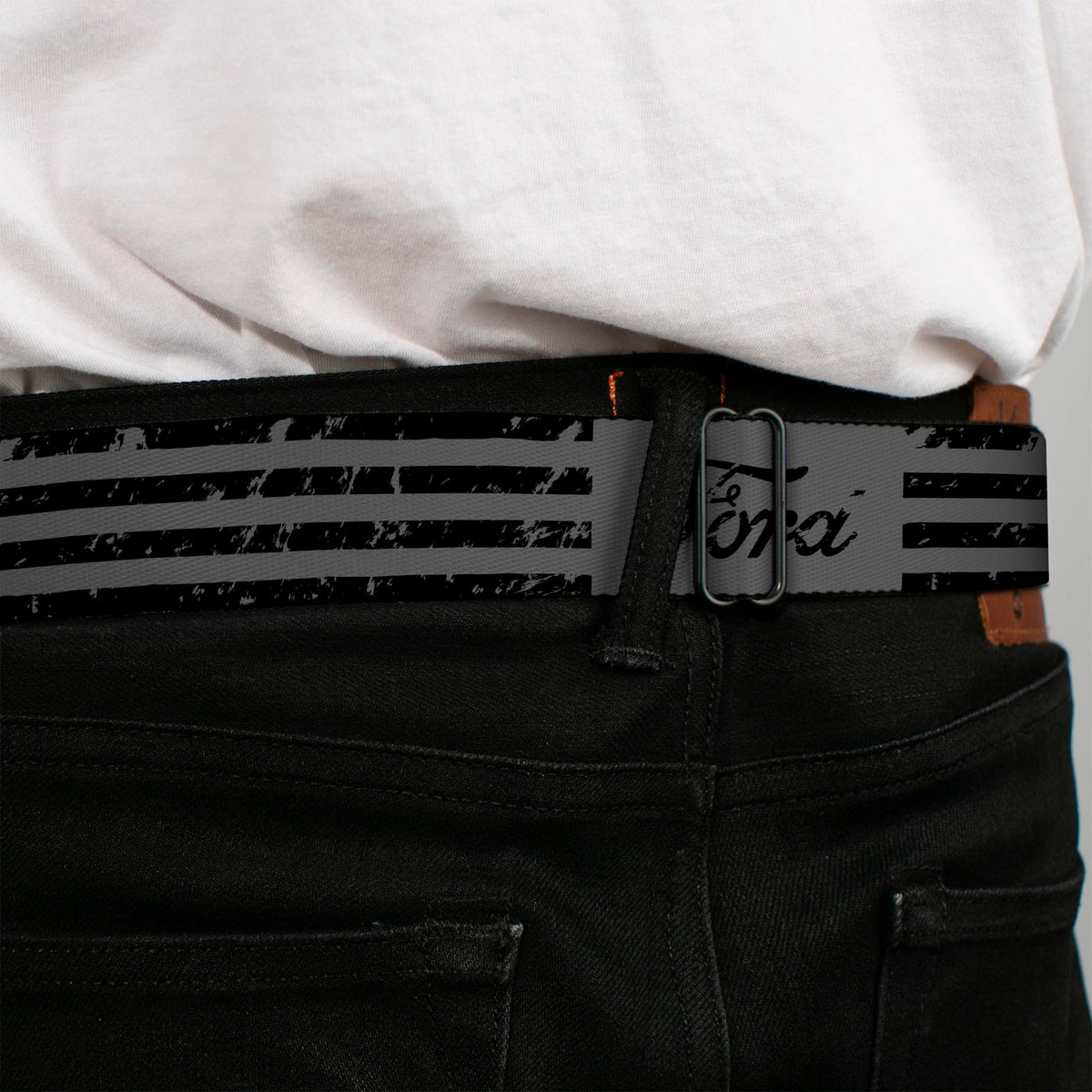 Buckle-Down seatbelt belt being adjusted for a comfortable fit