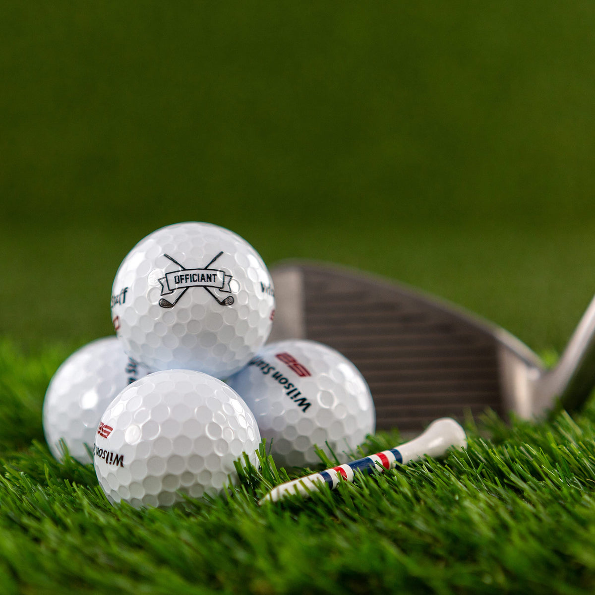 Wilson Staff Elite golf balls close-up, premium design for a thoughtful officiant gift