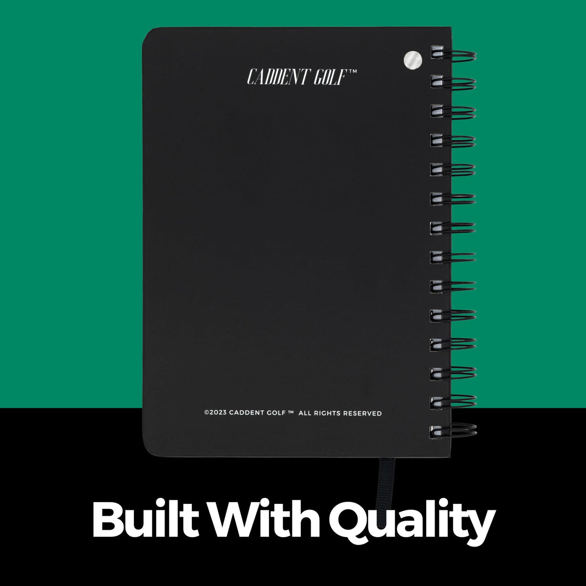 CADDENT GOLF log book open to show writing space and score areas.