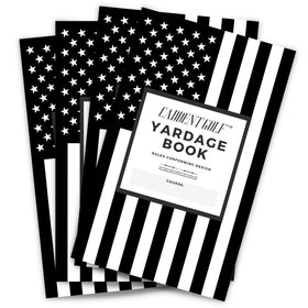 CADDENT GOLF yardage book with patriotic cover for quick distance notes on the course.