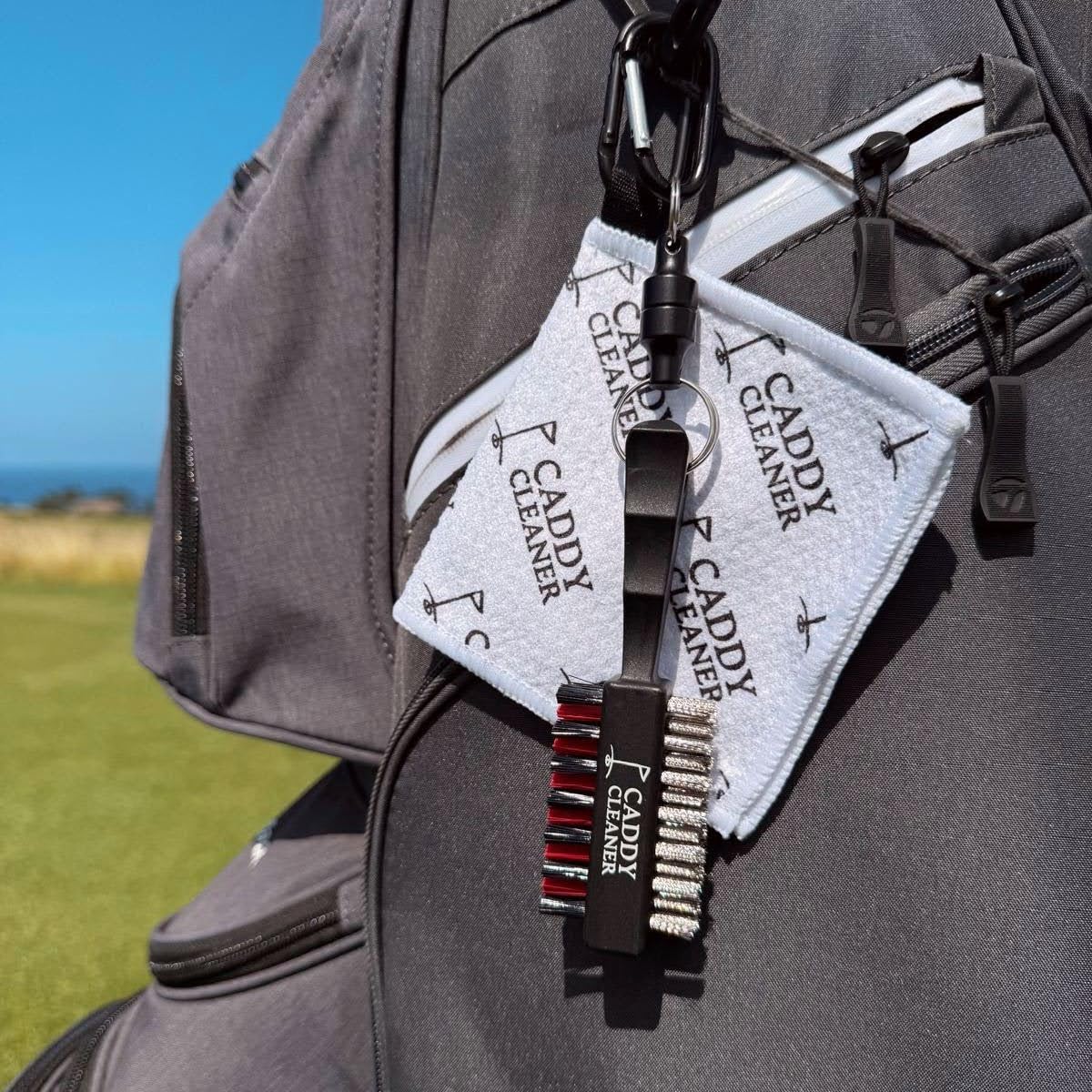 Caddy Cleaner dual-sided bristles tackle mud and sand on golf clubs.