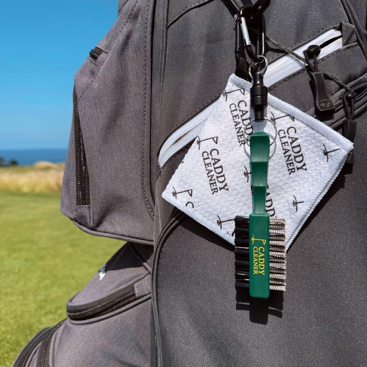 Caddy Cleaner dual-sided bristles sweeping mud from clubs