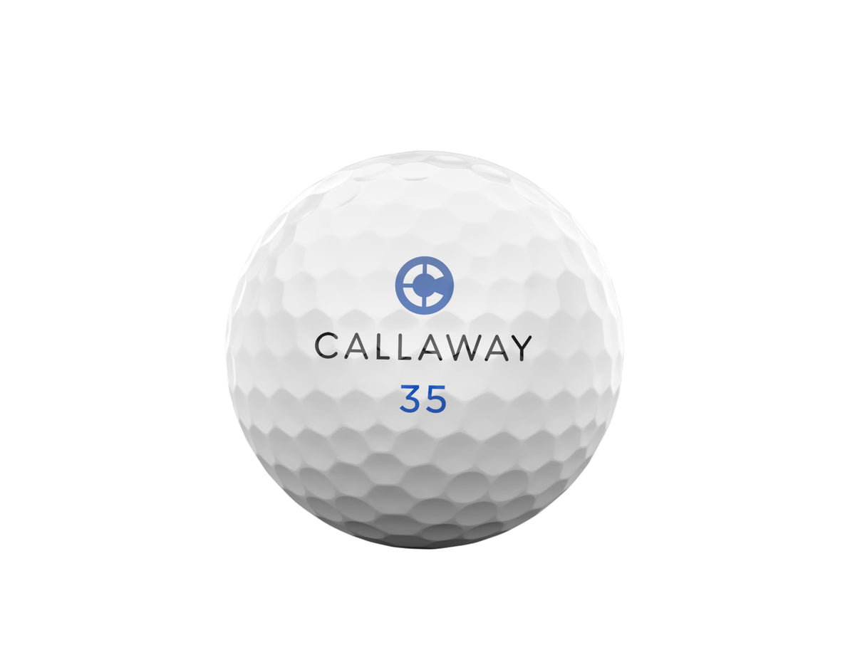 Callaway Chrome Tour 2026 ball closeup shows chrome sheen and speed-enhancing mantle design.