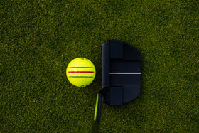 Callaway Chrome Tour yellow ball in wet conditions for visibility.