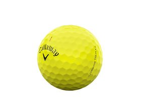 Callaway Chrome Tour X yellow ball in flight for long, penetrating distance.