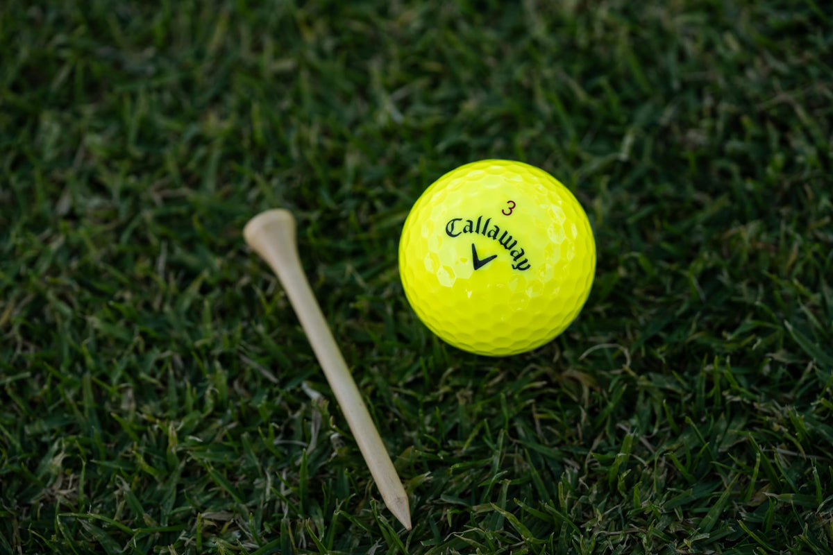 Callaway Chrome Tour X yellow ball on green demonstrates control.