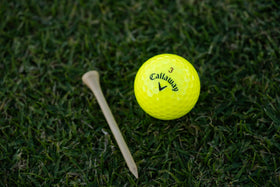 Callaway Chrome Tour X yellow ball on green demonstrates control.