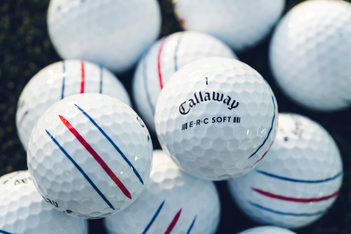 Callaway ERC Soft white ball on tee for clean setup.