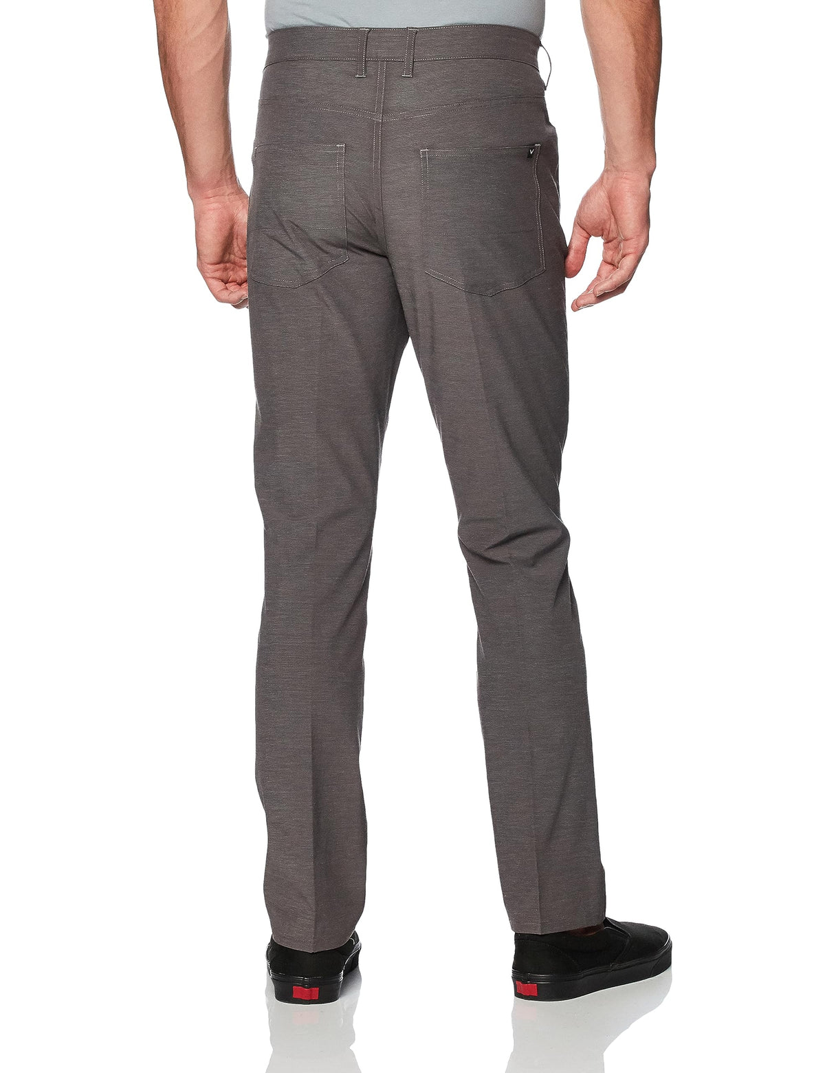 Callaway EverPlay 5-Pocket Pants on course action showing mobility and stretch for dynamic swings.