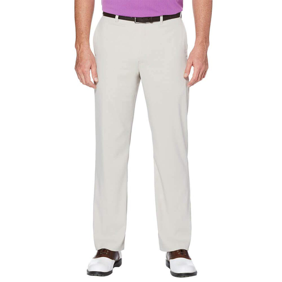 Callaway Men's Tech Golf Pants side view showing stretch fabric for unrestricted swing.