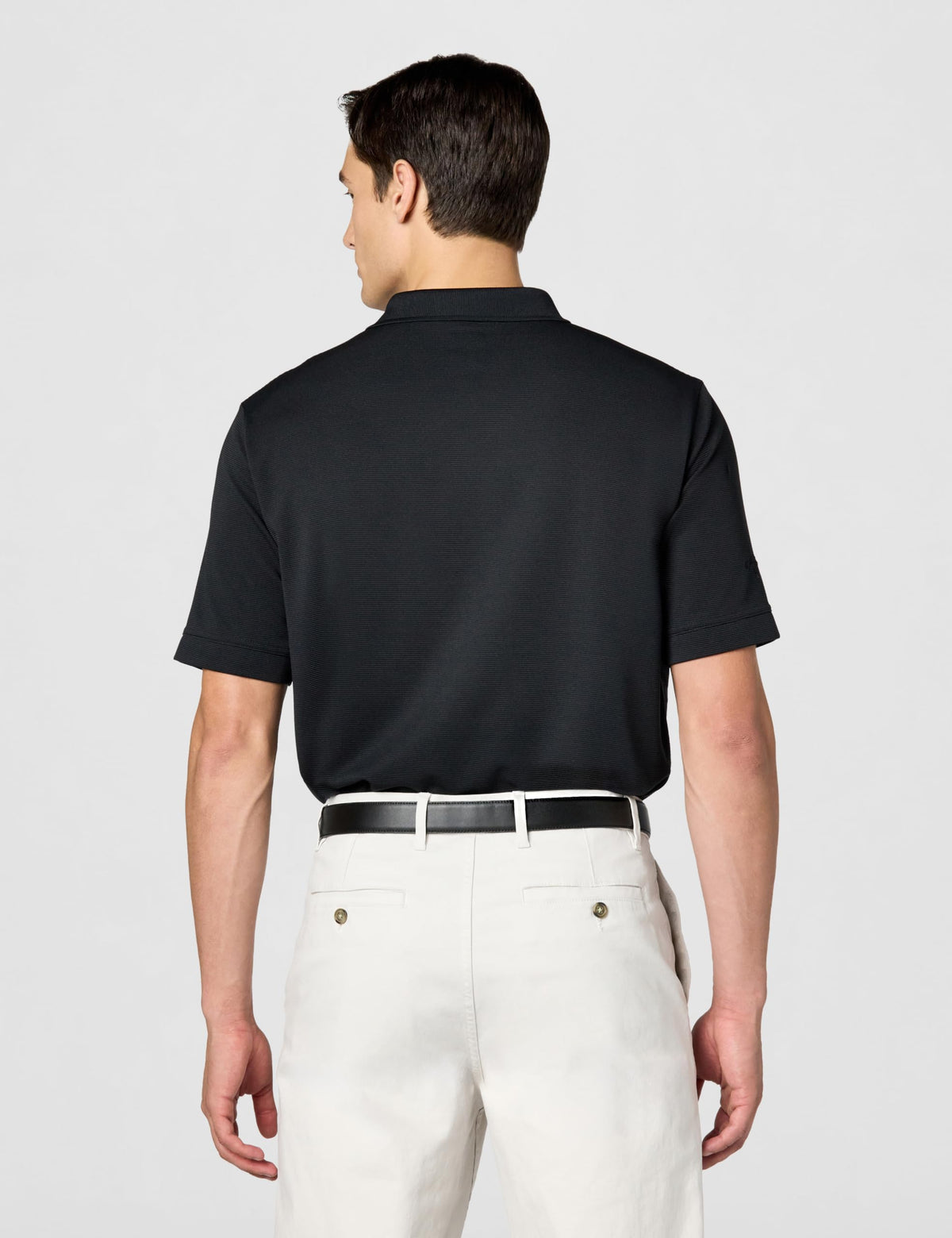 Stretch fabric enables full swings with a comfortable range of motion