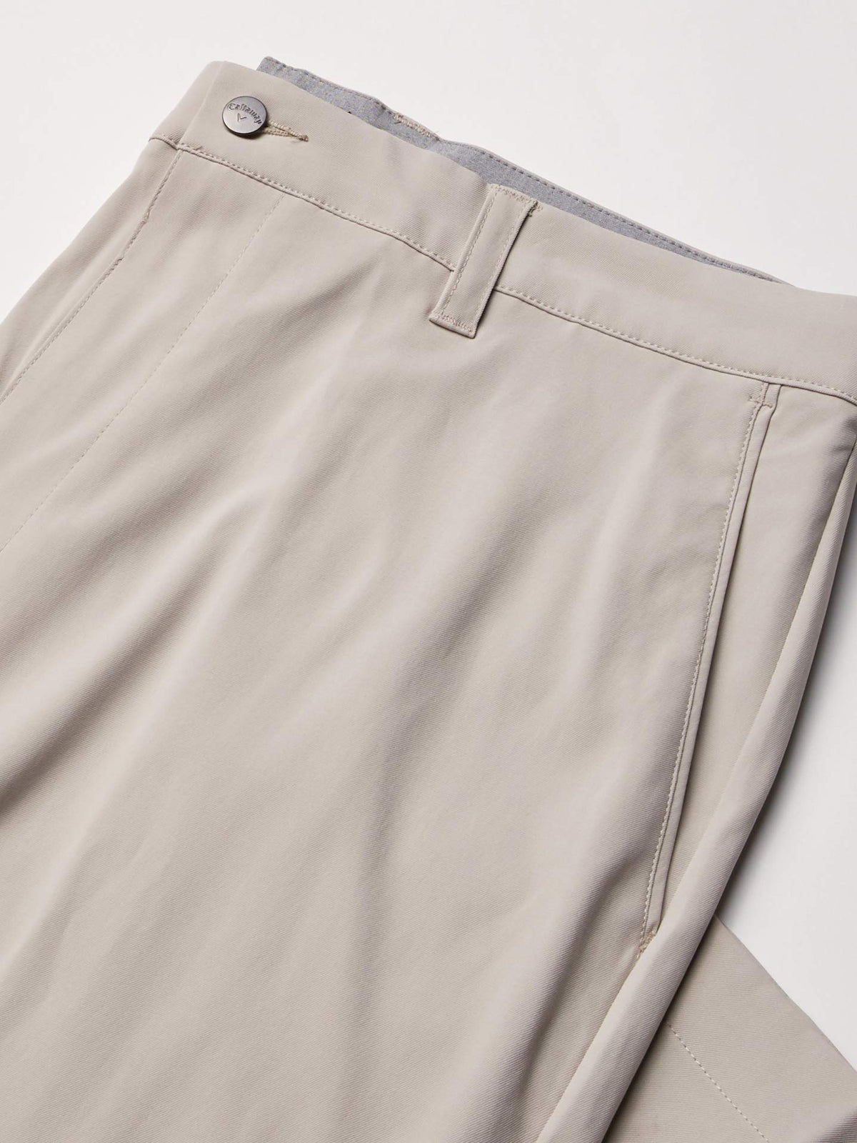 Callaway Opti-Stretch fabric texture highlights moisture-wicking performance in heat