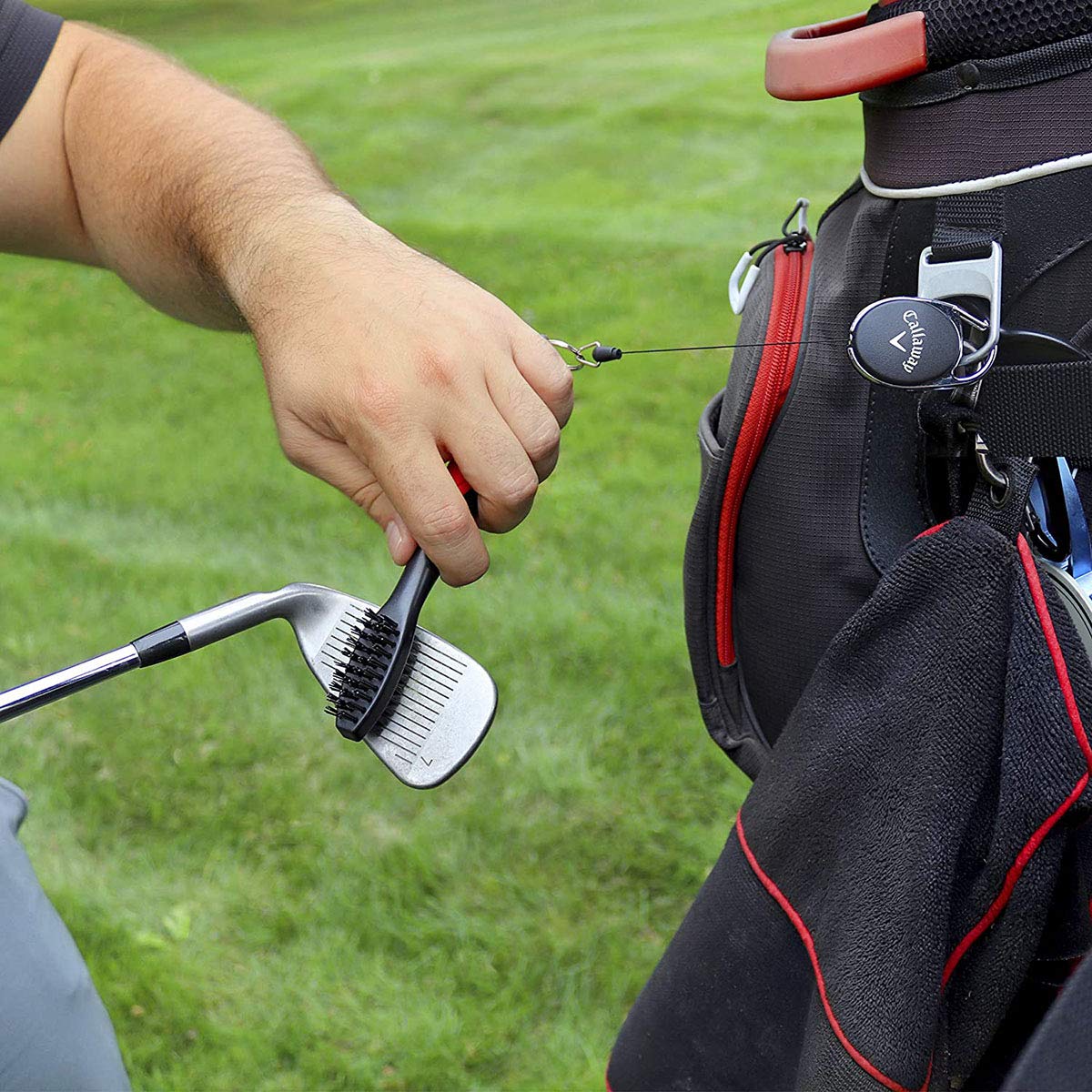Callaway Premium Golf Club Brush featuring carabiner clip attached to golf bag.