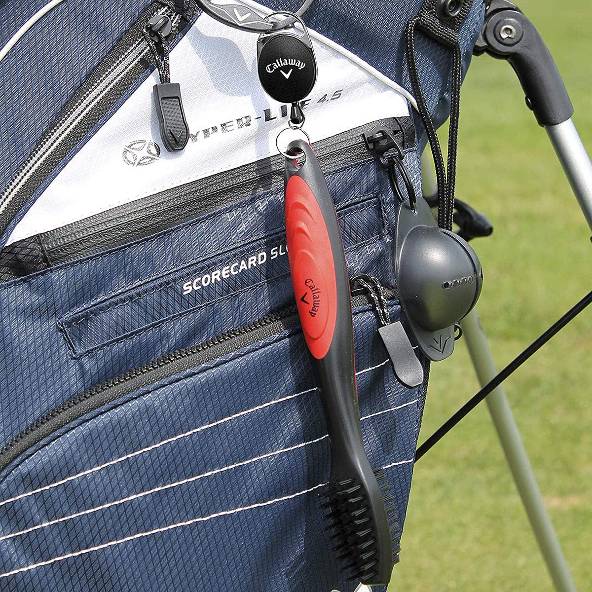 Callaway Premium Golf Club Brush shows retractable cord in action for quick access.