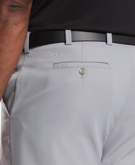 Callaway Pro Spin 3.0 stretch pants highlighting sun protection under bright skies.