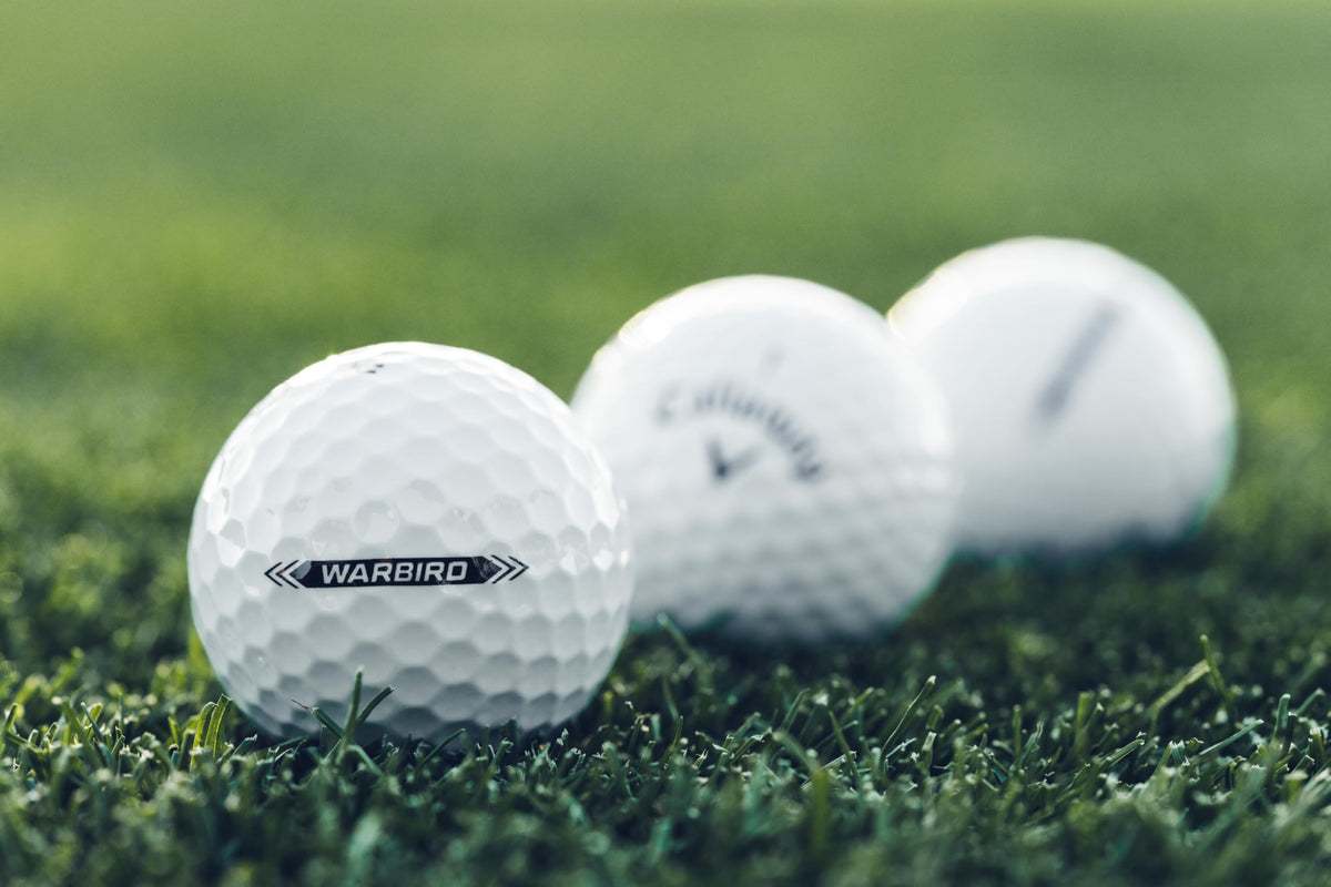 Callaway Warbird 2023 logo and ball surface detail, signaling value.