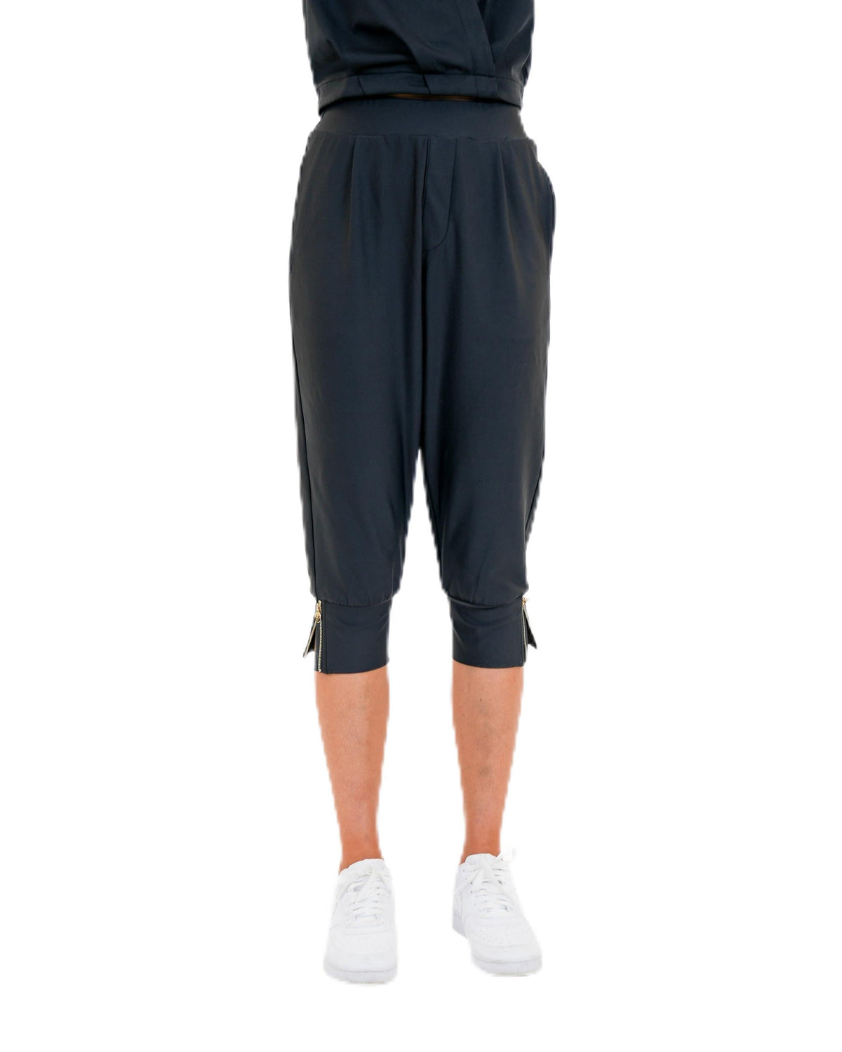 Calliope Amelia high-rise capri pants showcase flattering on-course silhouette.
