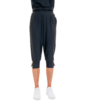 Calliope Amelia capri pants, front view showing a smooth high-rise silhouette for golf days.