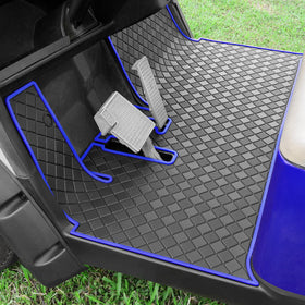 Cartalia golf cart floor liner with blue trim offers full-coverage protection from dirt.