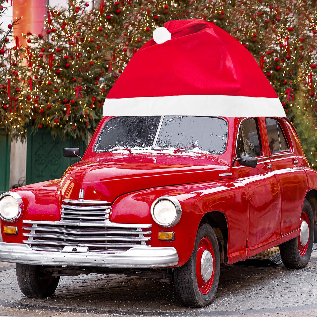 Cinrobiye Santa hat car decoration on a sedan adds festive curb appeal.