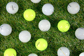 Clean Green Golf Balls bulk 48-pack in mesh bag for easy transport.