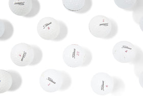Bulk Good Condition Clean Green Golf Balls ready for practice rounds.