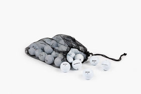 Clean Green Golf Balls mesh carrying bag shown with balls for transport.