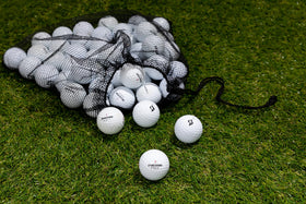 Minor logos on Clean Green Golf Balls show condition while preserving playability.