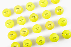 Clean Green Golf Balls used Titleist Tour Soft yellow offers reliable feel for mid-range shots.
