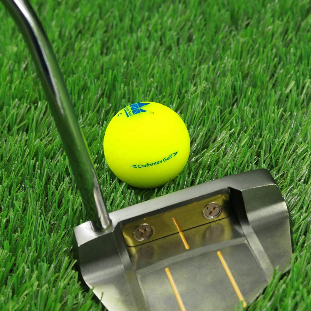 CRAFTSMAN GOLF yellow ball shows a guiding arrow to aid putting alignment.