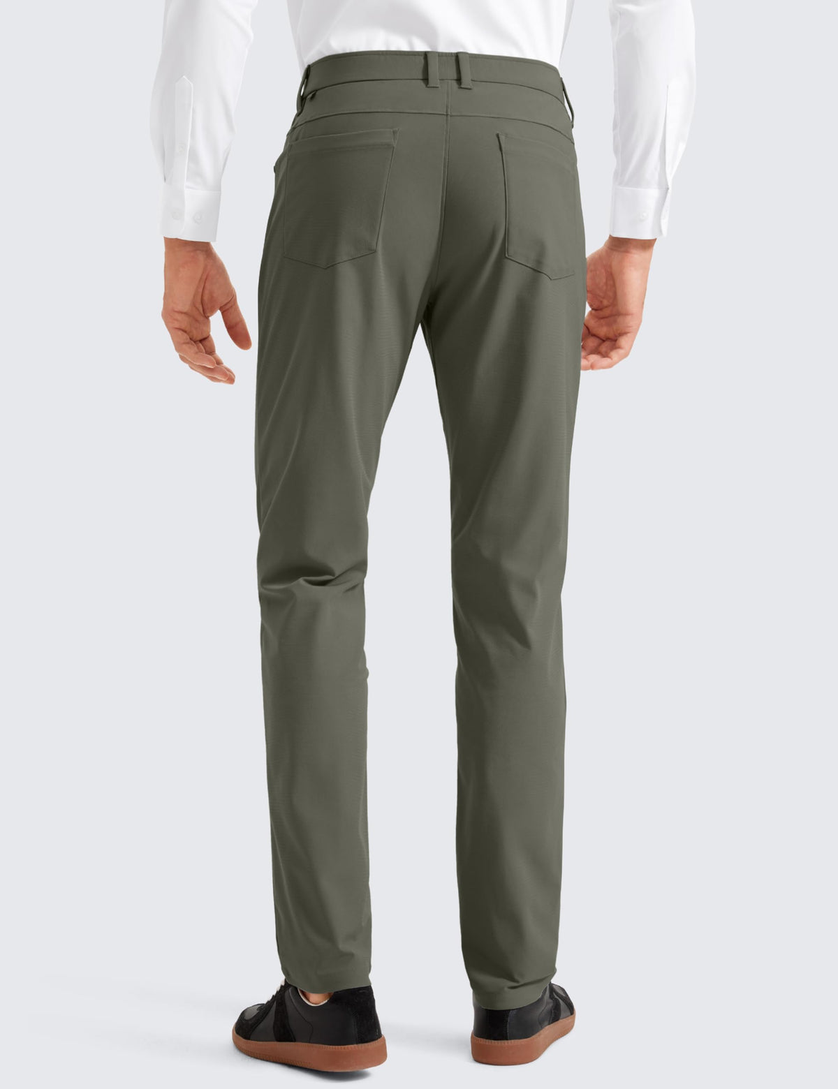 CRZ YOGA All Day Comfy golf pants side view highlights slim silhouette and tapered leg