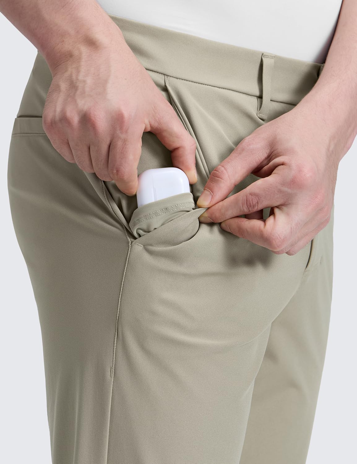CRZ YOGA golf pants showing multiple pockets for secure storage
