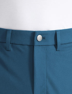 CRZ YOGA iron blue golf pants fabric close-up showing breathable, wrinkle-resistant weave