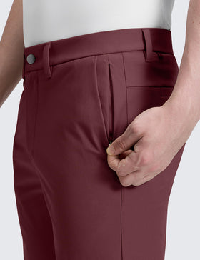 CRZ YOGA men's All Day Comfy Golf Pants in motion showing flexible, wrinkle-resistant fabric.