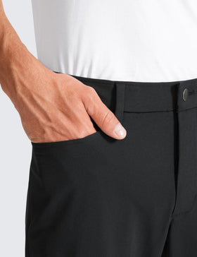 CRZ YOGA men's all-day comfy golf pants on course action demonstrating mobility