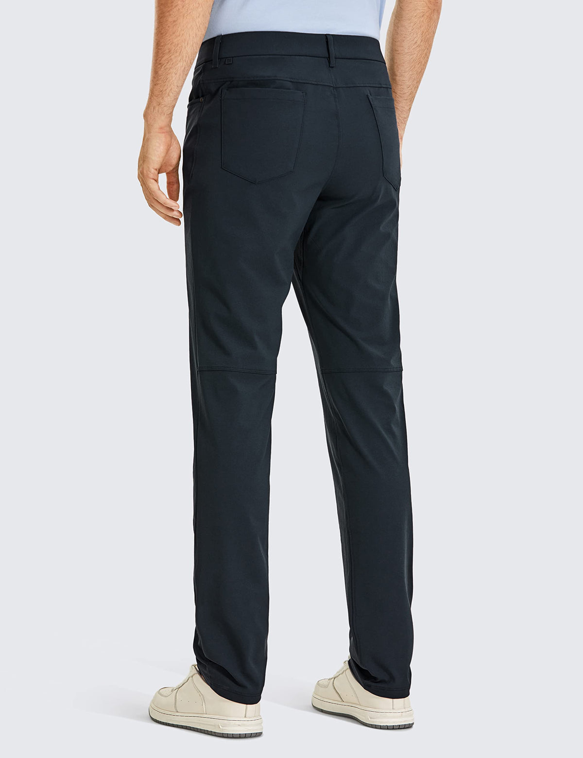 CRZ YOGA pants with multiple pockets in true navy for secure storage