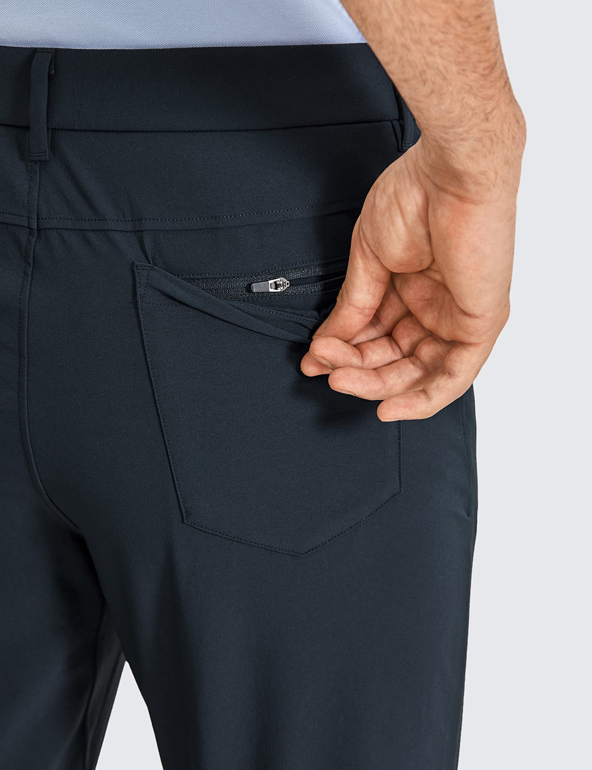 CRZ YOGA stretch golf pants in true navy; waterproof fabric for light rain