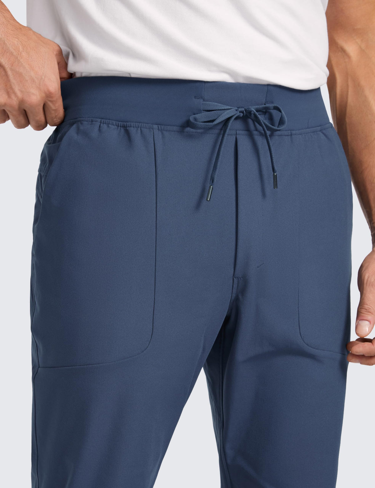 CRZ YOGA joggers with elastic waist and drawstring show secure, adjustable fit.
