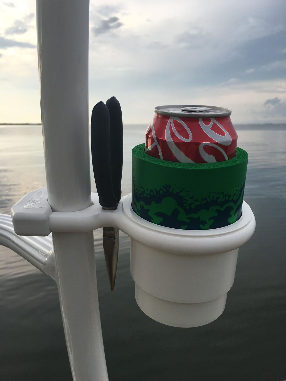 Cuda Cup small deck rail attachment demonstrates secure mounting on rails.
