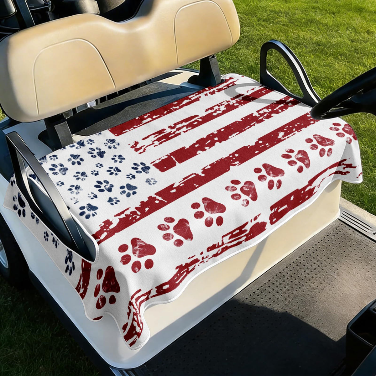 Cylanta American flag dog paw seat cover on a 51x31 golf cart seat, providing durable protection.