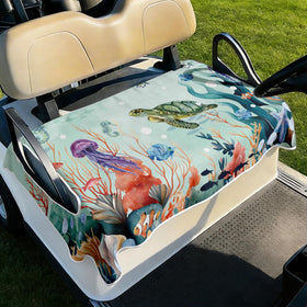 Cylanta sea turtle seat cover on a golf cart, providing grip and comfort.