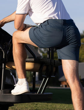 Dababell shorts close-up zip pocket demonstrates secure storage during rounds.
