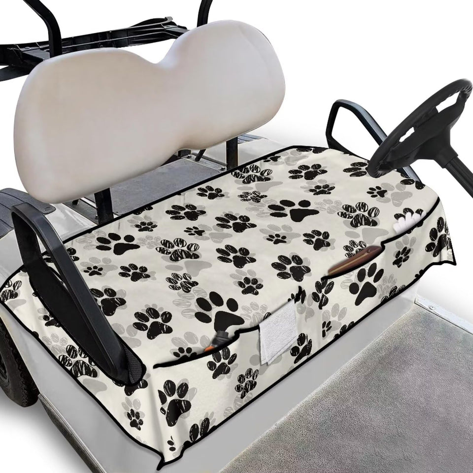 Darisoco Black Dog Paw seat cover with front pockets organizes accessories on the golf cart.